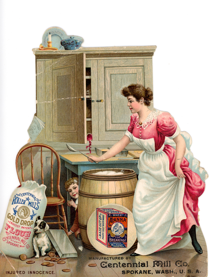 A woman in a white and pink dress is in a kitchen, stirring a barrel with a spoon. A young boy peeks from behind the barrel. On the left, a dog sits near a broken jar labeled "Centennial Mills Roller Mills Gold Drop Flour." A chair, a cabinet with a door ajar, and a shelf with a candle and a bowl are visible. A box labeled "Wheat Manna for Breakfast" is on the floor. The text "Manufactured by Centennial Mill Co. Spokane, Wash., U.S.A." is at the bottom. The words "Injured Innocence" are also written on the floor.