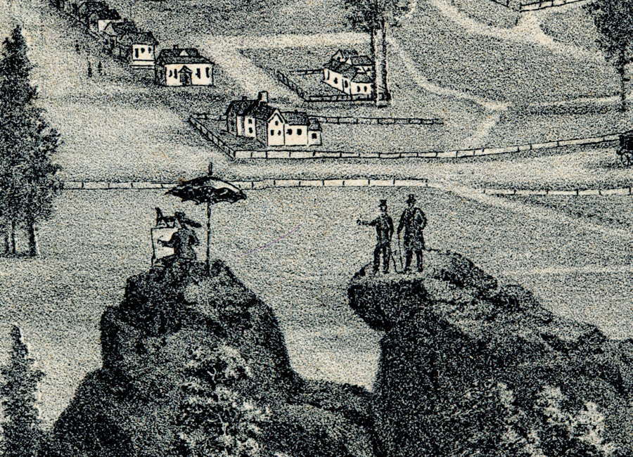 Two men standing on a rocky outcrop, one pointing, with a few houses and trees in the background. On an adjacent rock, a person sits under an umbrella next to an easel. More houses and a path are visible in the distance.