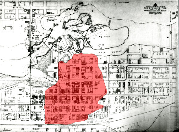 A map depicting a town layout with streets labeled, including Broadway, Bridge St., W. Front St., W. Main St., and W. Riverside Ave. A red shaded area highlights a section of the map, encompassing multiple blocks. The map includes water channels labeled North Channel, Middle Channel, and South Channel, as well as Big Island and sections of land. The title reads 