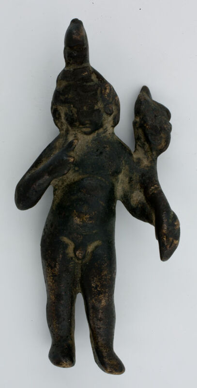 A sculpture cast in leaded bronze depicting the Roman- Egyptian God Harpocrates.