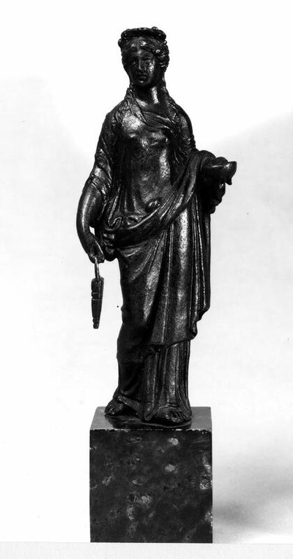 A small statue of a priestess holding items commonly associated with the Cult of Isis, made of bronze, found near Vesuvius