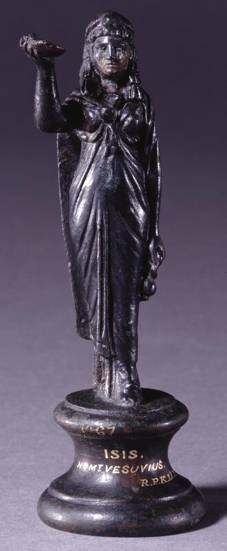A small reconstructed statue of the deity Isis, made of bronze, found near Vesuvius